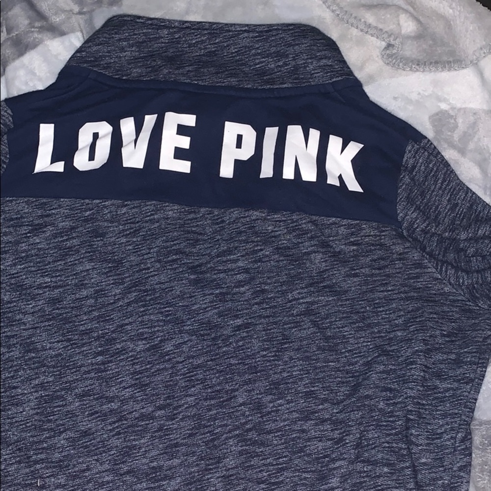 A pink pullover jacket